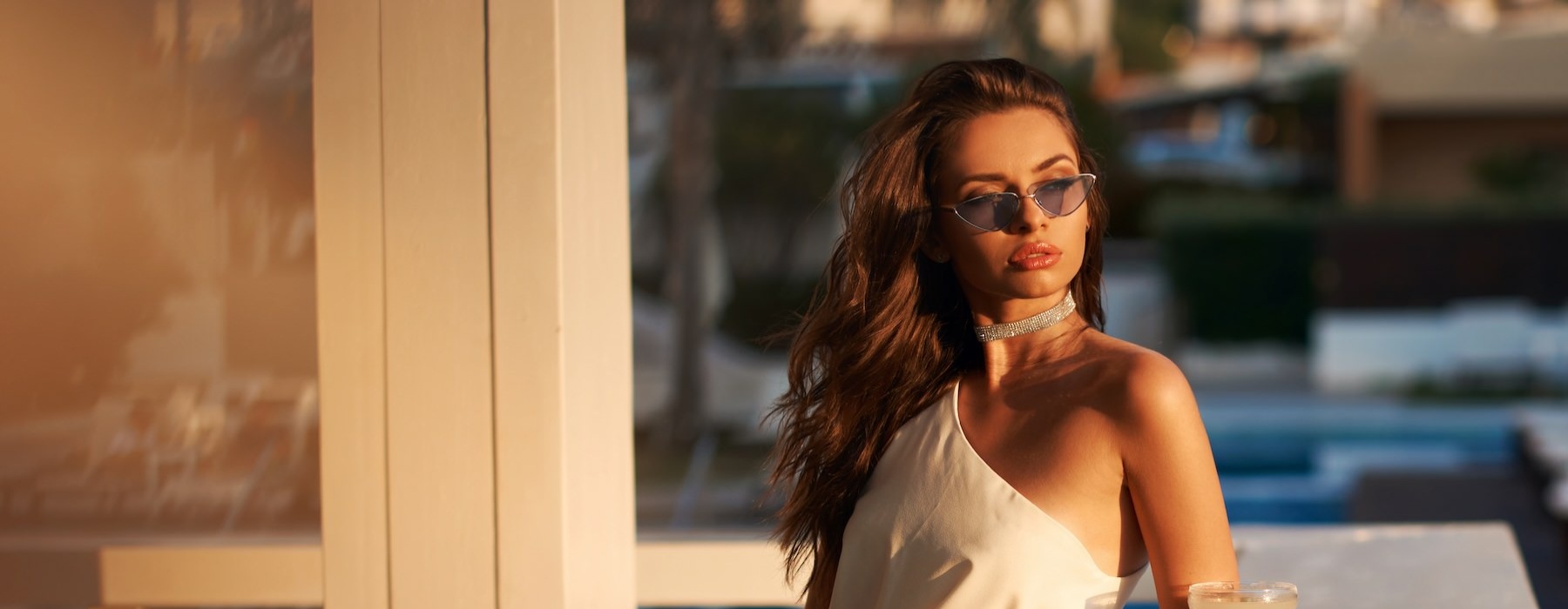 a woman leaning on a counter