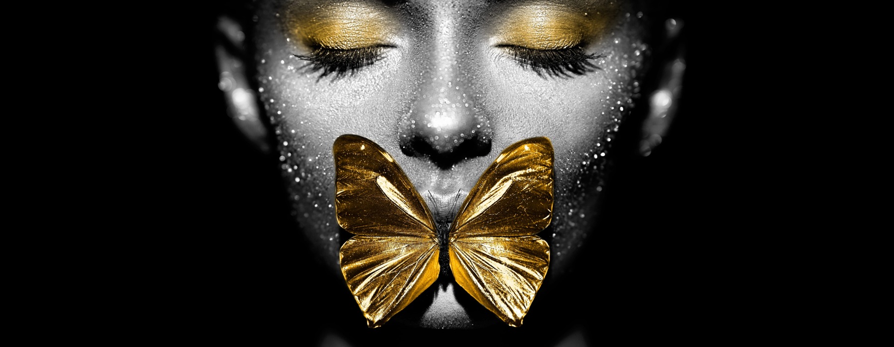 a image of a woman with a golden butterfly